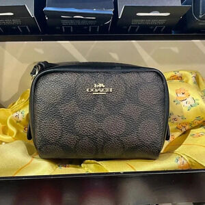 COACH Pouch Wristlet In Signature Canvas